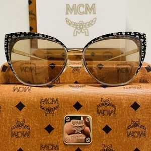 MCM Brand Sunglasses Style 144S Style in color 734